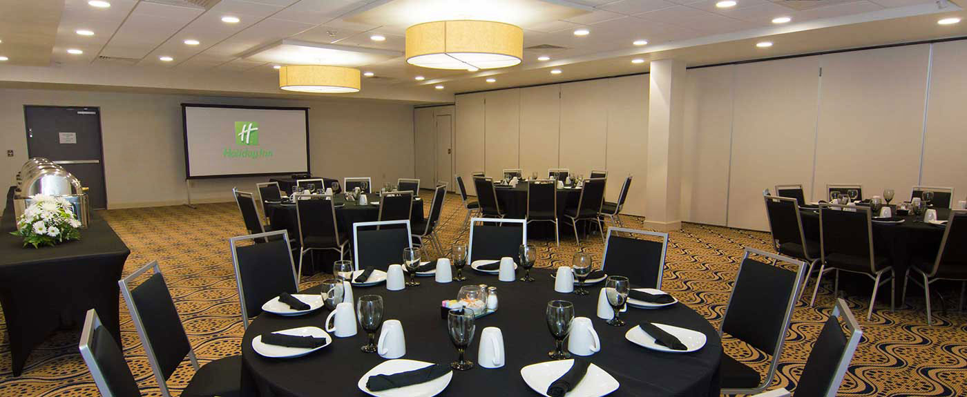 Meeting Space - Banquet Rounds and Projector Screen, Catering